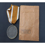 GERMAN DEFENSE WEST WALL MEDAL IN ITS ORIGINAL PACKET OF ISSUE