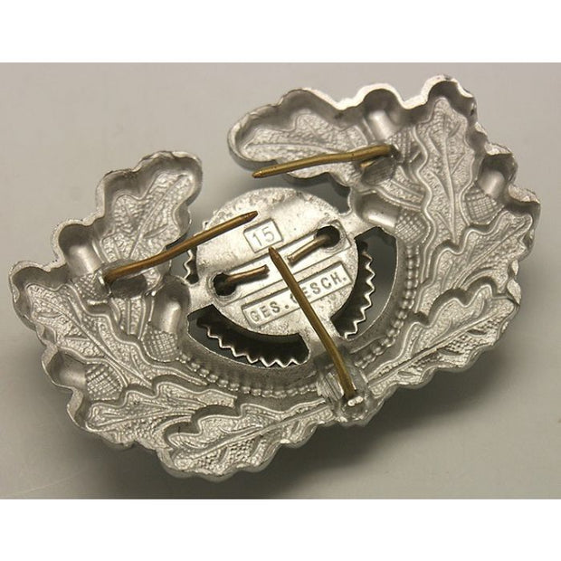 GERMAN HEER VISOR CAP WREATH AND COCKADE IN SILVER WWII